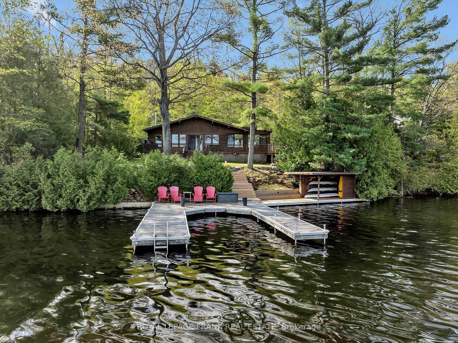 Lovesick Lake. Absolutely charming 3 bedroom cottage with commanding open lake island views, privacy, good swimming amp ; spectacular sunset exposure.