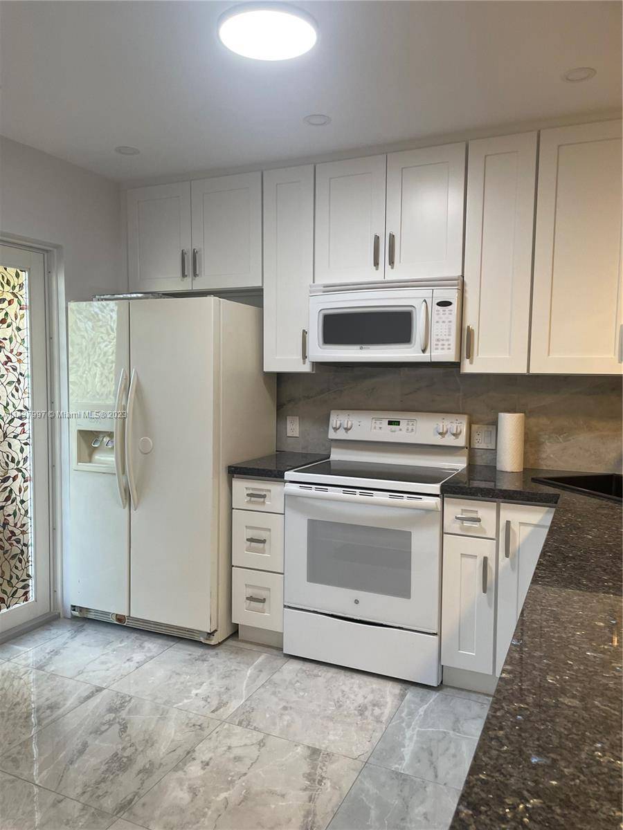 Beautiful just totally remodeled corner rarely available 2beds 2baths unit in Irvington Gardens Condo.