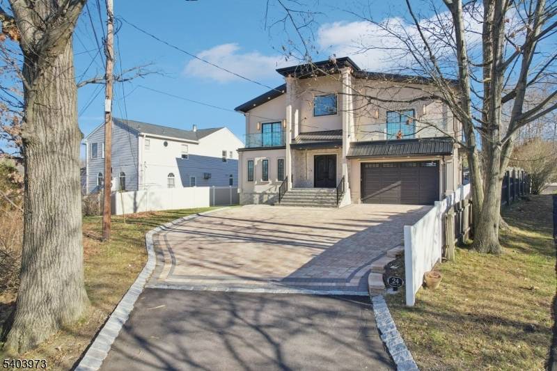 Welcome home to this expansive New Construction 5 bedroom, 3 bathroom Colonial, ideally situated on a quiet residential street.