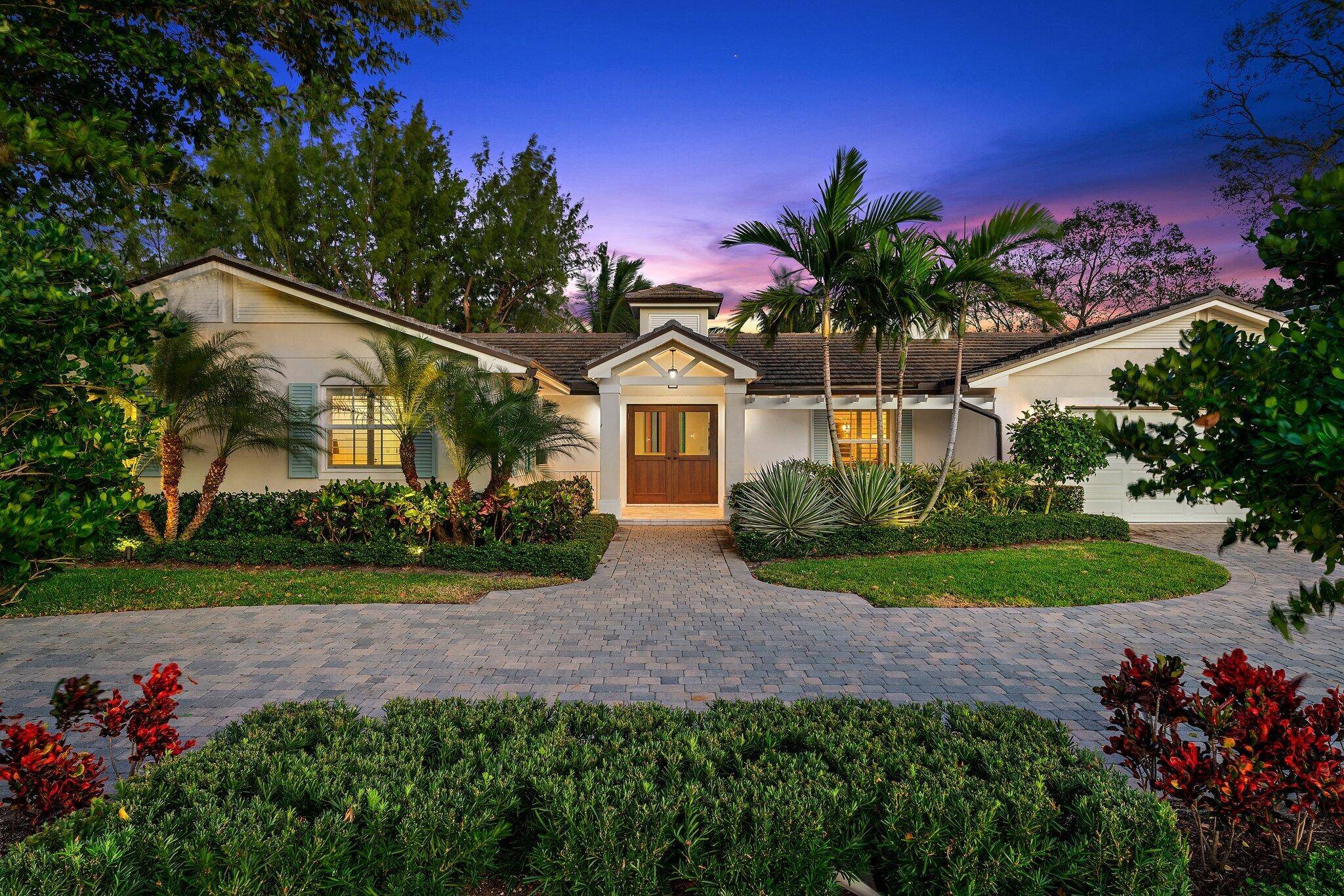 Exquisitely reconstructed lakefront, golf course home with unsurpassed sunrise to sunset breezes and views encompassing the 16th, 17th, and 18th holes, in the heart of North Palm Beach !
