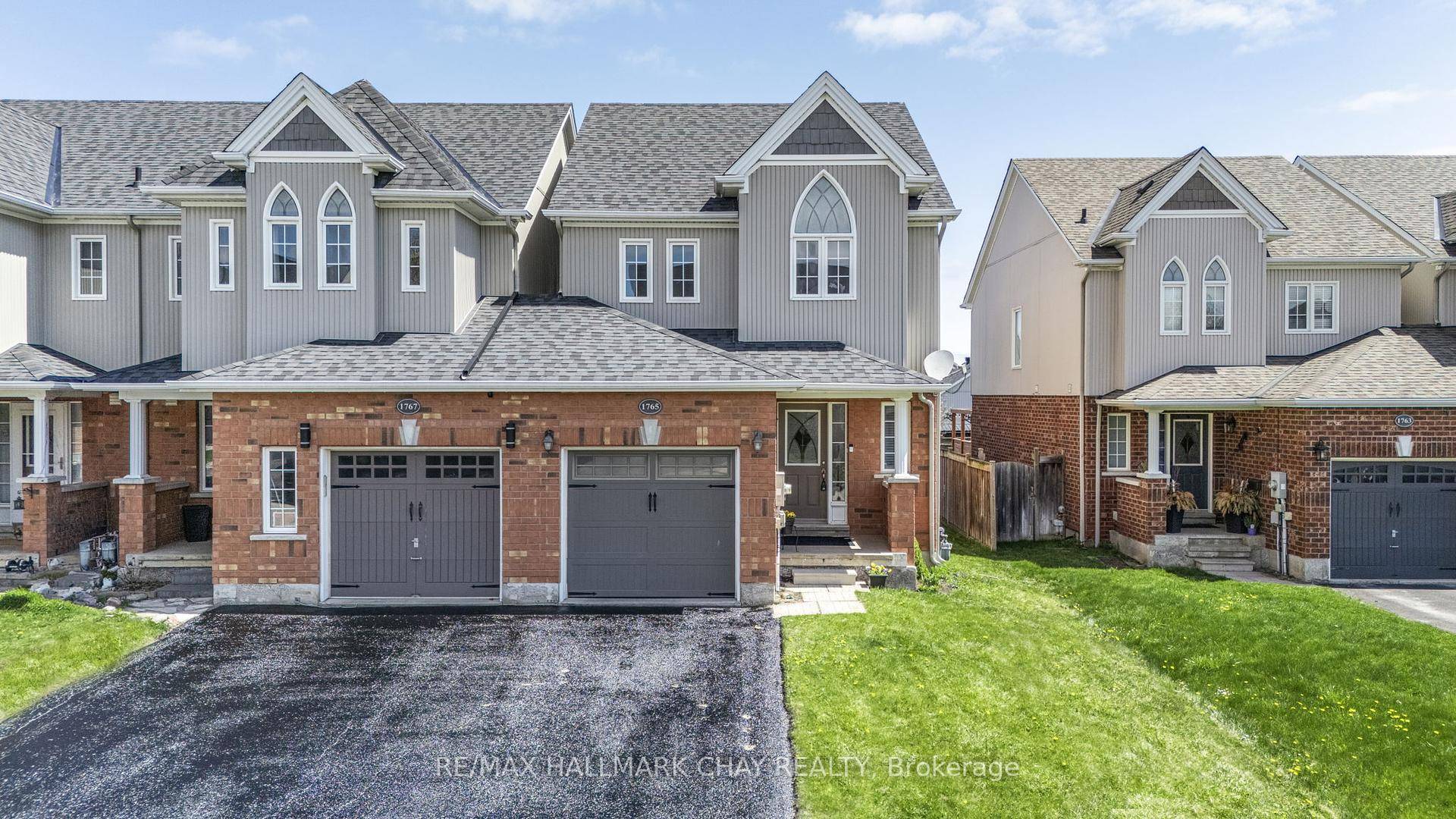 End Unit Townhome Nestled On Extra Deep 26 x 132 Ft Lot In Sought After Alcona !