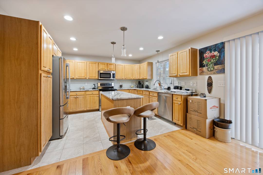 Priced to Please ! Tucked away in an East End cul de sac, this beautiful 2, 280 sq ft Colonial delivers the perfect blend of space, comfort, and classic charm.