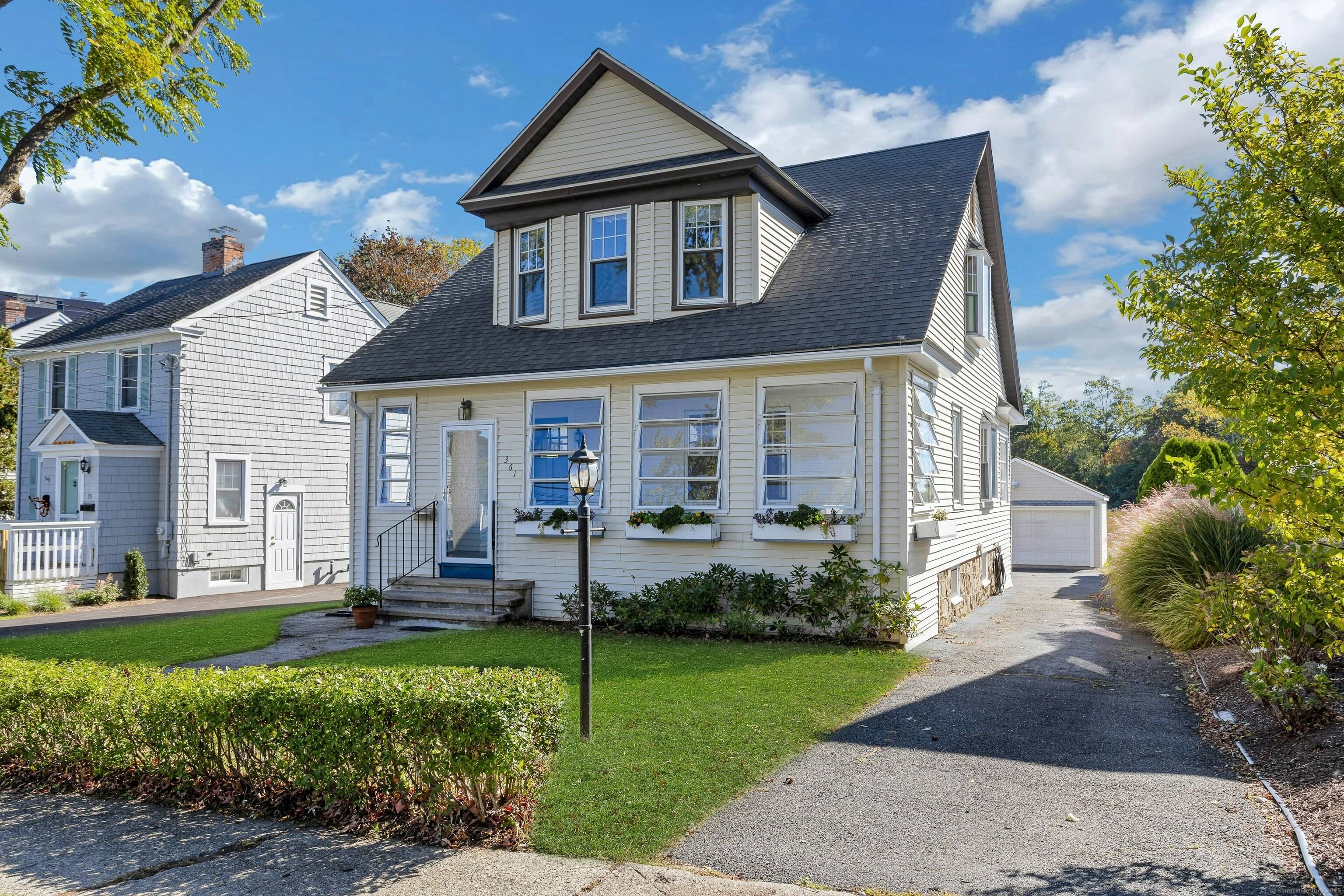 On the banks of Ash Creek with a truly breathtaking vista, it's easy to see why there have been only two owners of this charming house since its 1928 construction ...