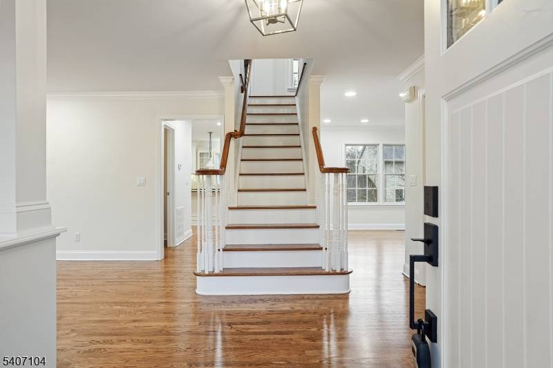 Updated 4 bedroom, 2. 5 bath Colonial featuring a Gourmet Eat in Kitchen with Granite Countertops, Stainless Steel Appliances, Center Island, and Breakfast Area with access to the Deck and ...