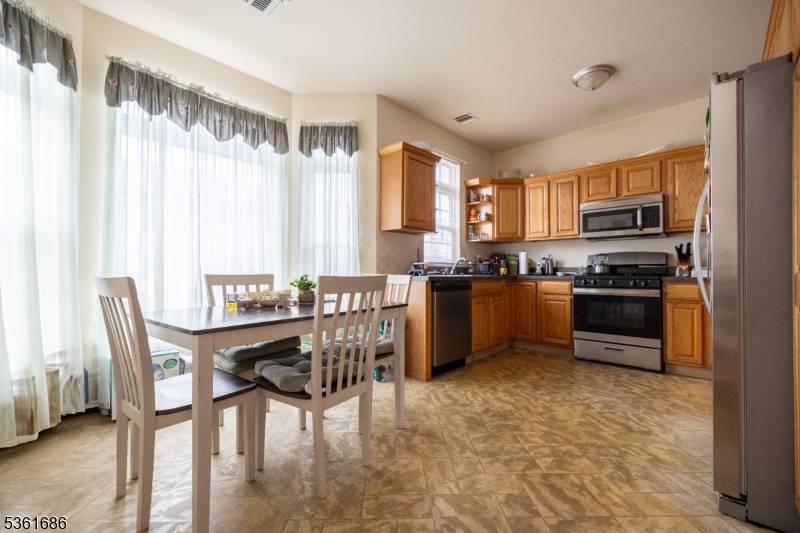 Spacious three floor townhome, with Two bedrooms with a loft and a den area which could be made into three bedrooms.
