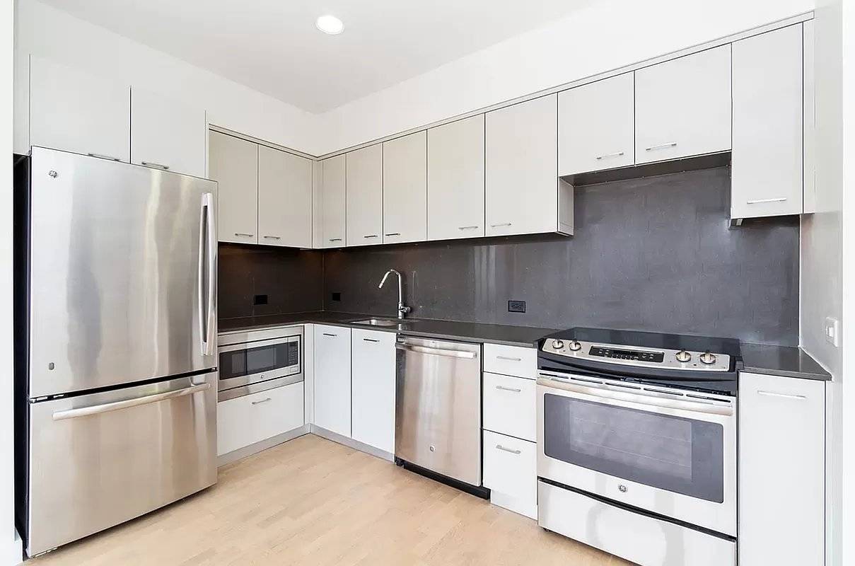 West Facing 4th Floor One Bedroom for June 1stApartment Features Modern Kitchen with Quartz Countertops Stainless Steel Appliances Full Sized Dishwasher Built In Microwave Washer Dryer In Unit Oversized Windows ...