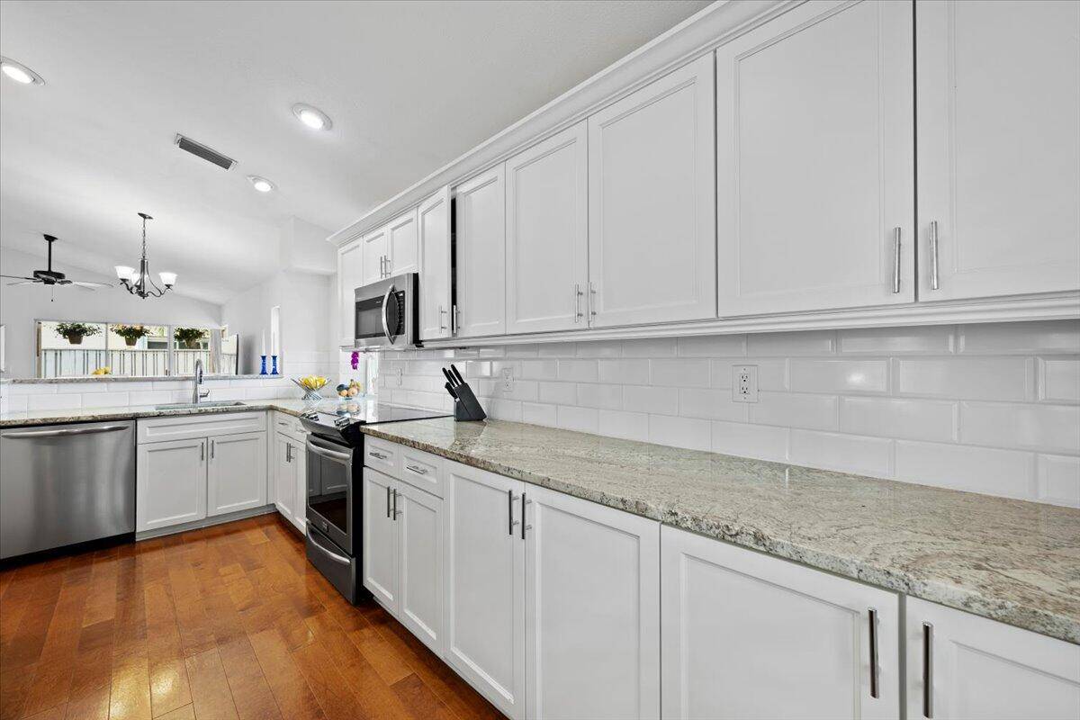 Remodeled single story, 2 BR, 2 BA, 1 car garage featuring hardwood floors throughout, custom kitchen w granite tops, stainless steel appliances, great storage, cathedral ceilings, open floor plan, 2017 ...