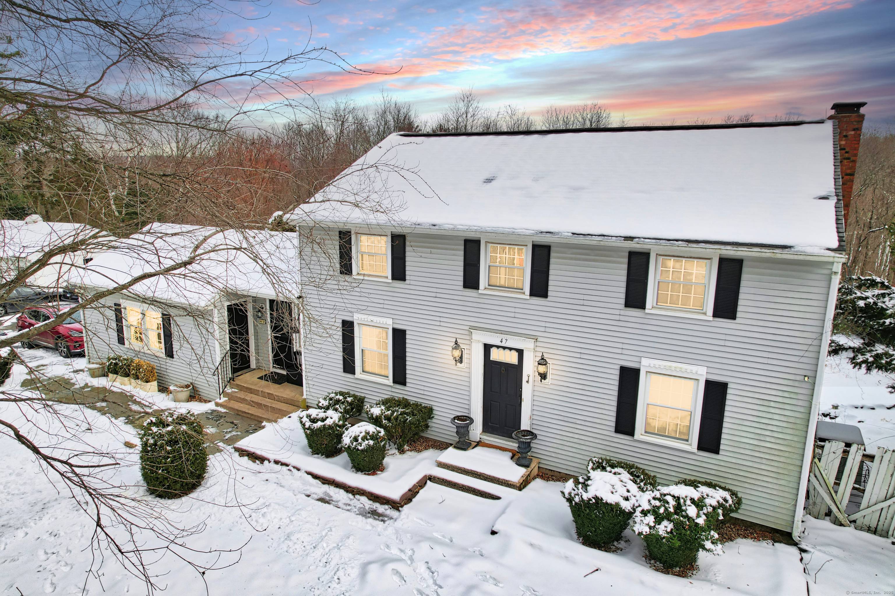 Nestled on over 3 acres of picturesque rolling terrain in Wolcott, Connecticut, this charming 3 bedroom, 2.