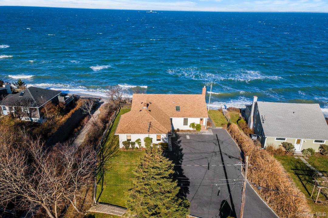 Discover the beauty of Soundfront living in this well cared for 3 bedroom, 2 bath both updated ranch set on.