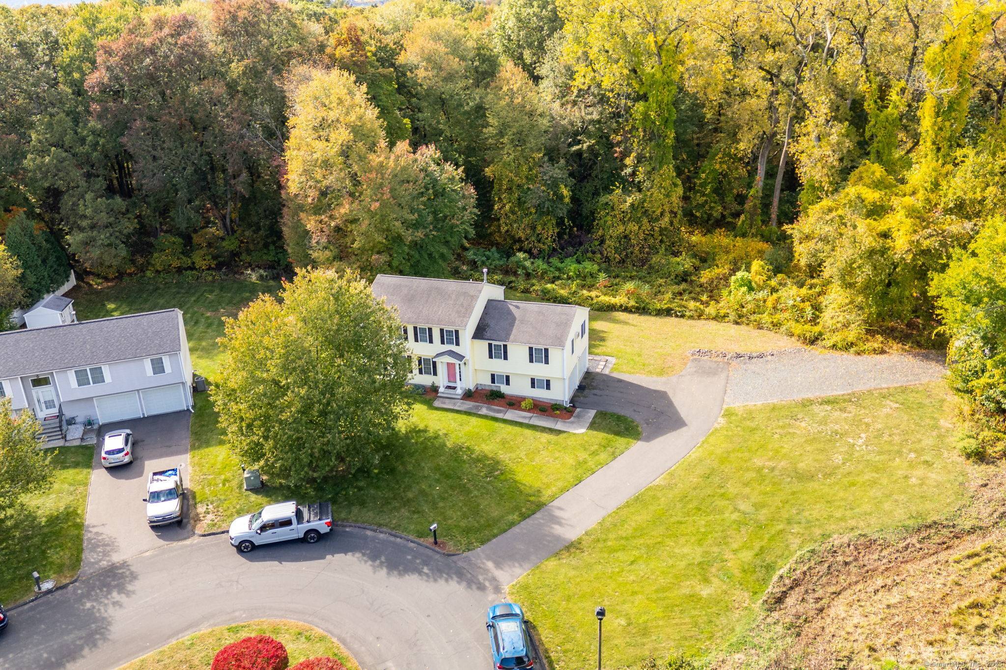 Welcome home to this sun filled and beautifully maintained 4 bedroom, 3 bath split colonial offering over 3000 square feet of inviting living space.