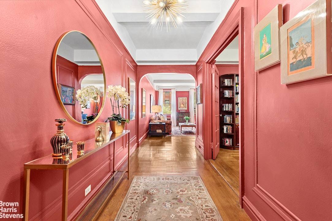 One enters the apartment through a gracious entry gallery leading to a spacious south facing living room, and a large west facing formal dining room.