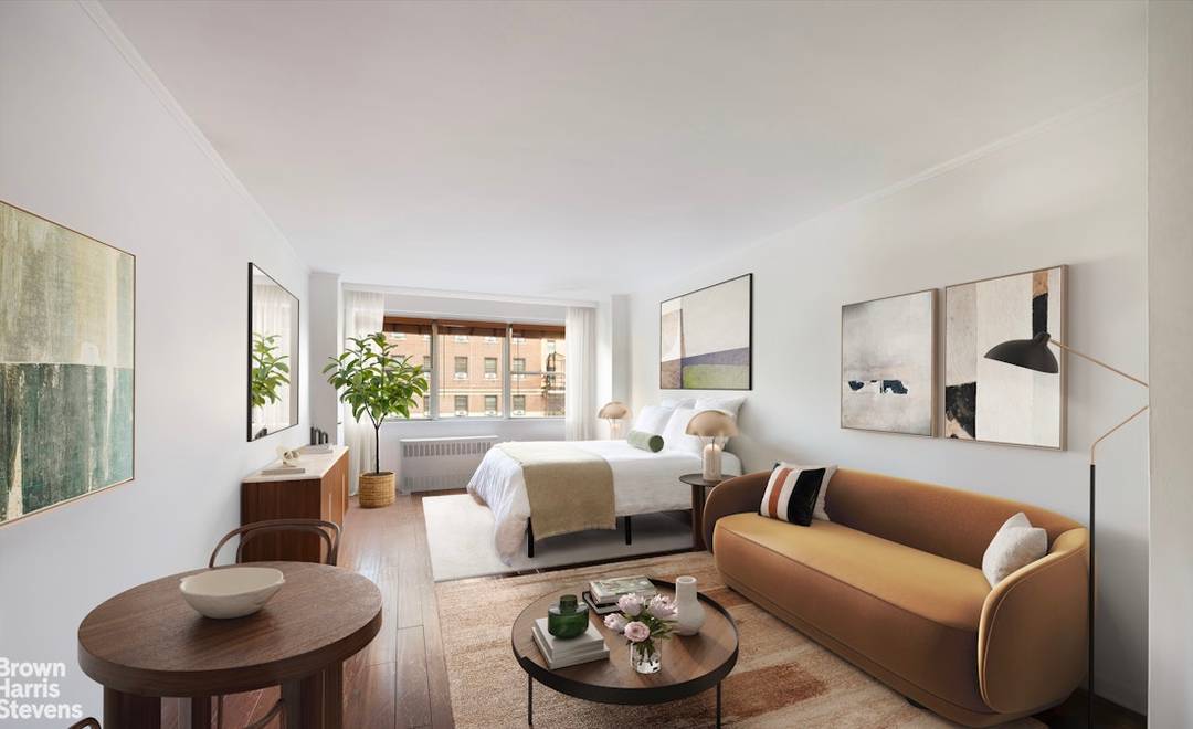 A Bright and Spacious Hudson Yards Studio with Low Maintenance Residence 5G is a generously sized studio featuring a highly functional layout, expansive windows, and exceptional storage.