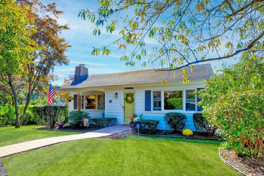 This charming corner lot home is filled with warmth, character, and endless potential !