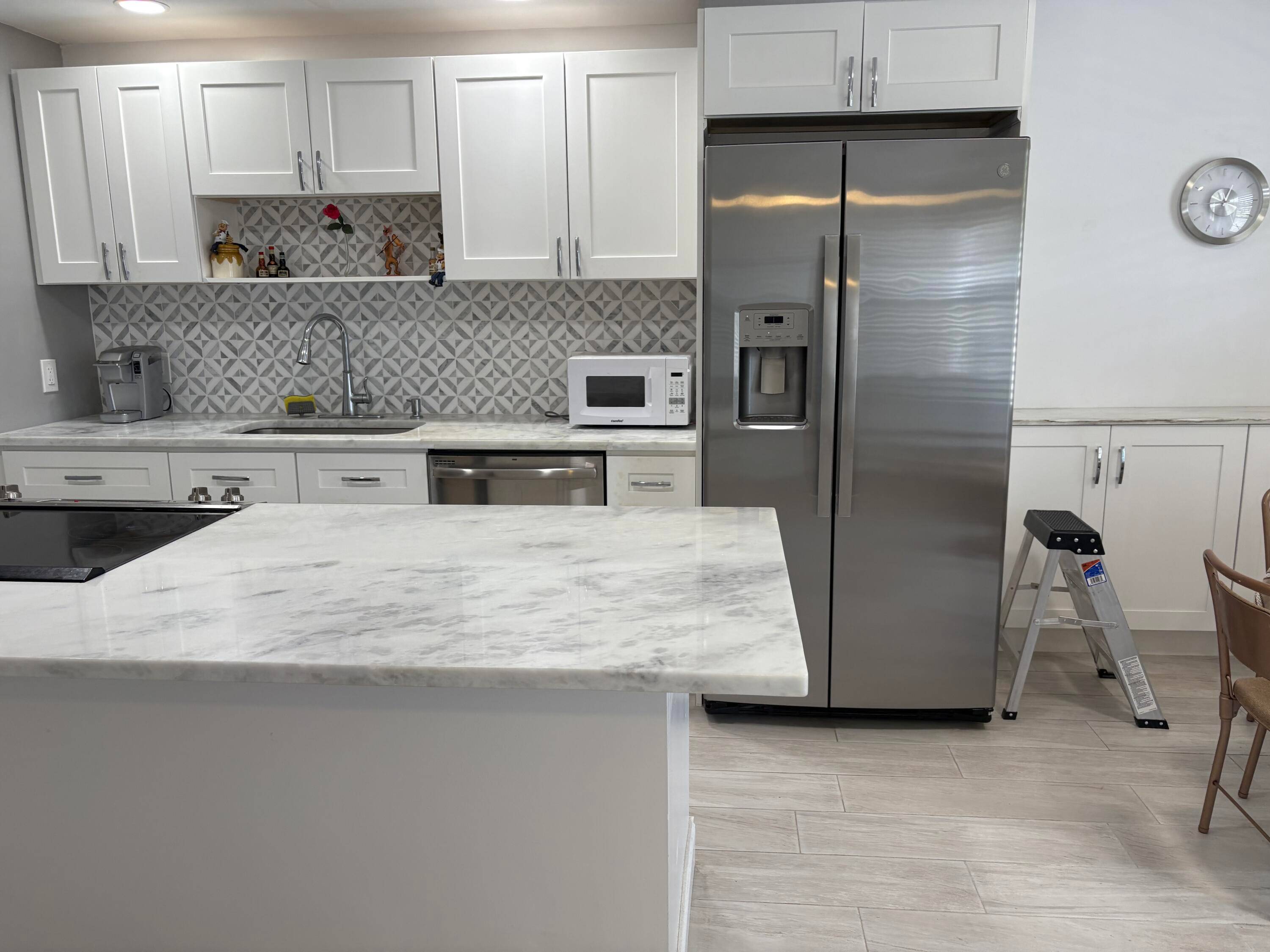 BRING ALL OFFERS. Don't miss this opportunity to own this beautifully renovated Exeter Condo, Open kitchen has custom white cabinets with pull out drawers, stainless steel appliances, quartzite counter tops.