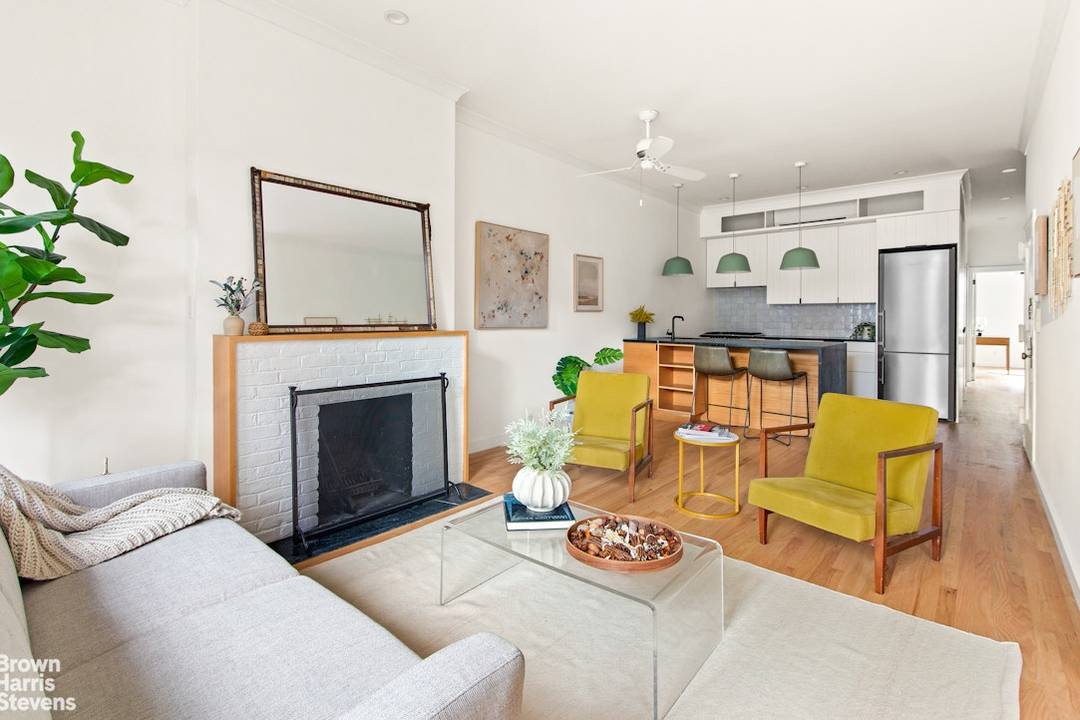 Spread out in this lovely two bedroom, two bath condo off 5th Avenue in prime Park Slope with prewar details and craftsman finishes.
