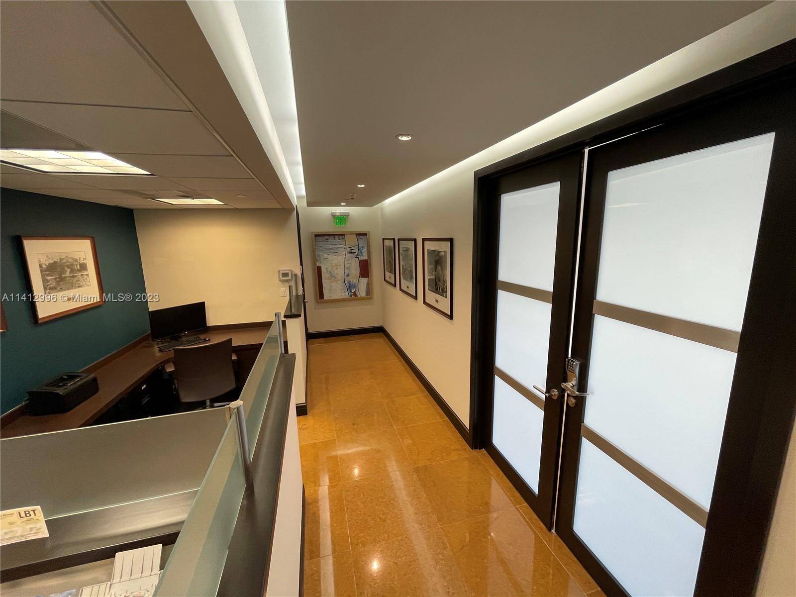Seize this opportunity to lease shared office space in Merrick Pointe's 10th floor penthouse, located in Coral Gables.