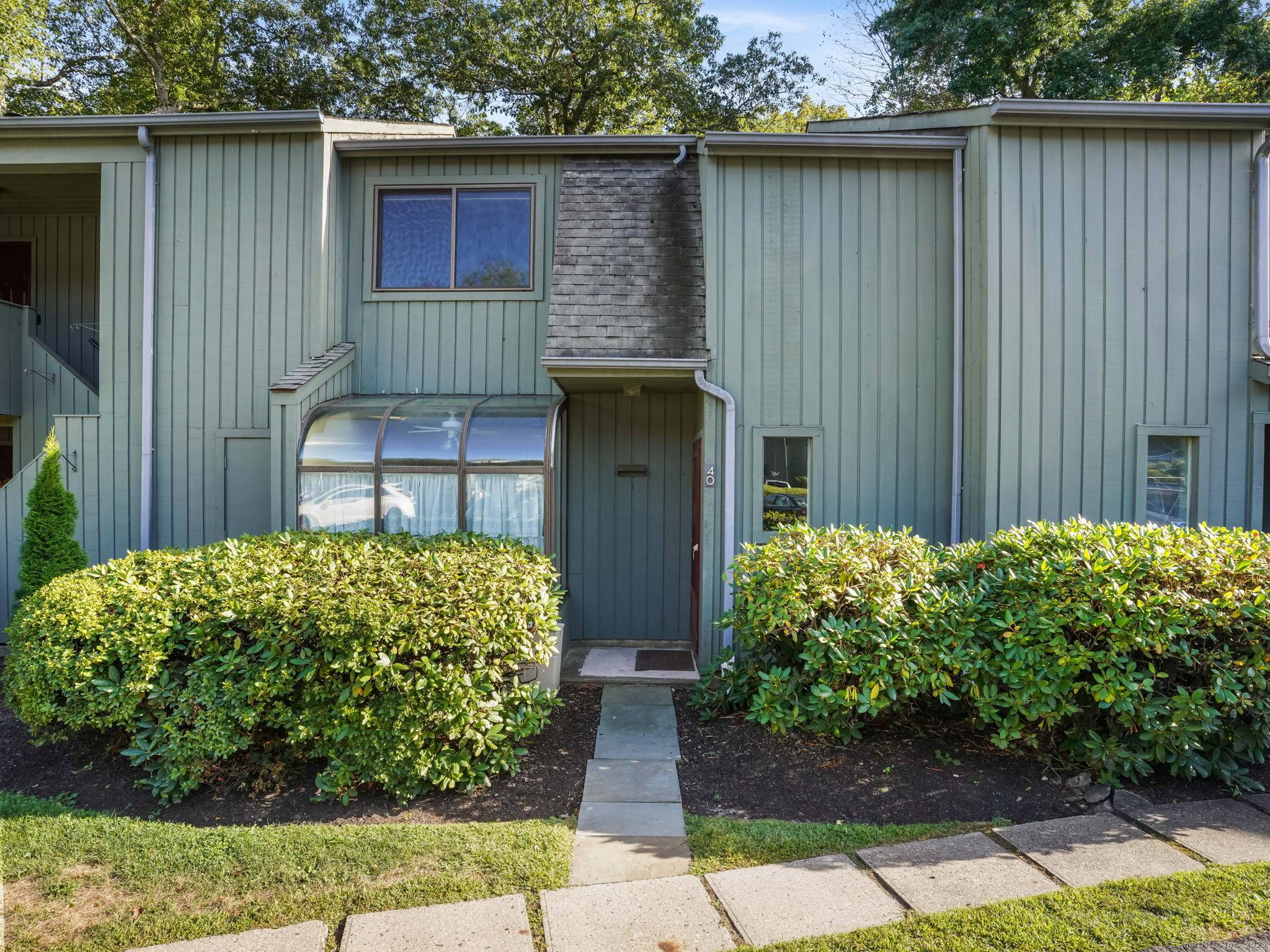 Welcome to this beautifully updated 2 bedroom, 2 half bath townhouse tucked in the tranquil, wooded Silvermine Crossing community on the Norwalk Wilton line.