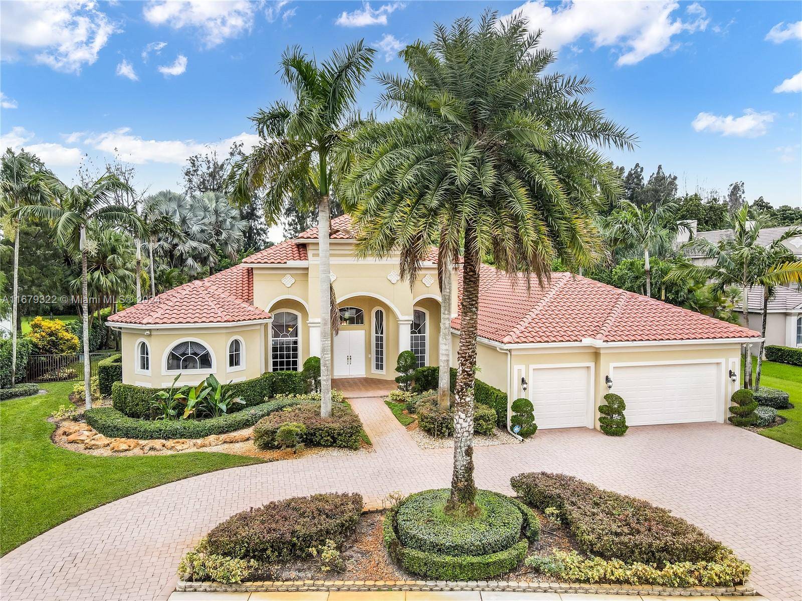 Welcome to this exquisite custom built home on a builder s acre in the prestigious gated community of Stonebrook Estates.