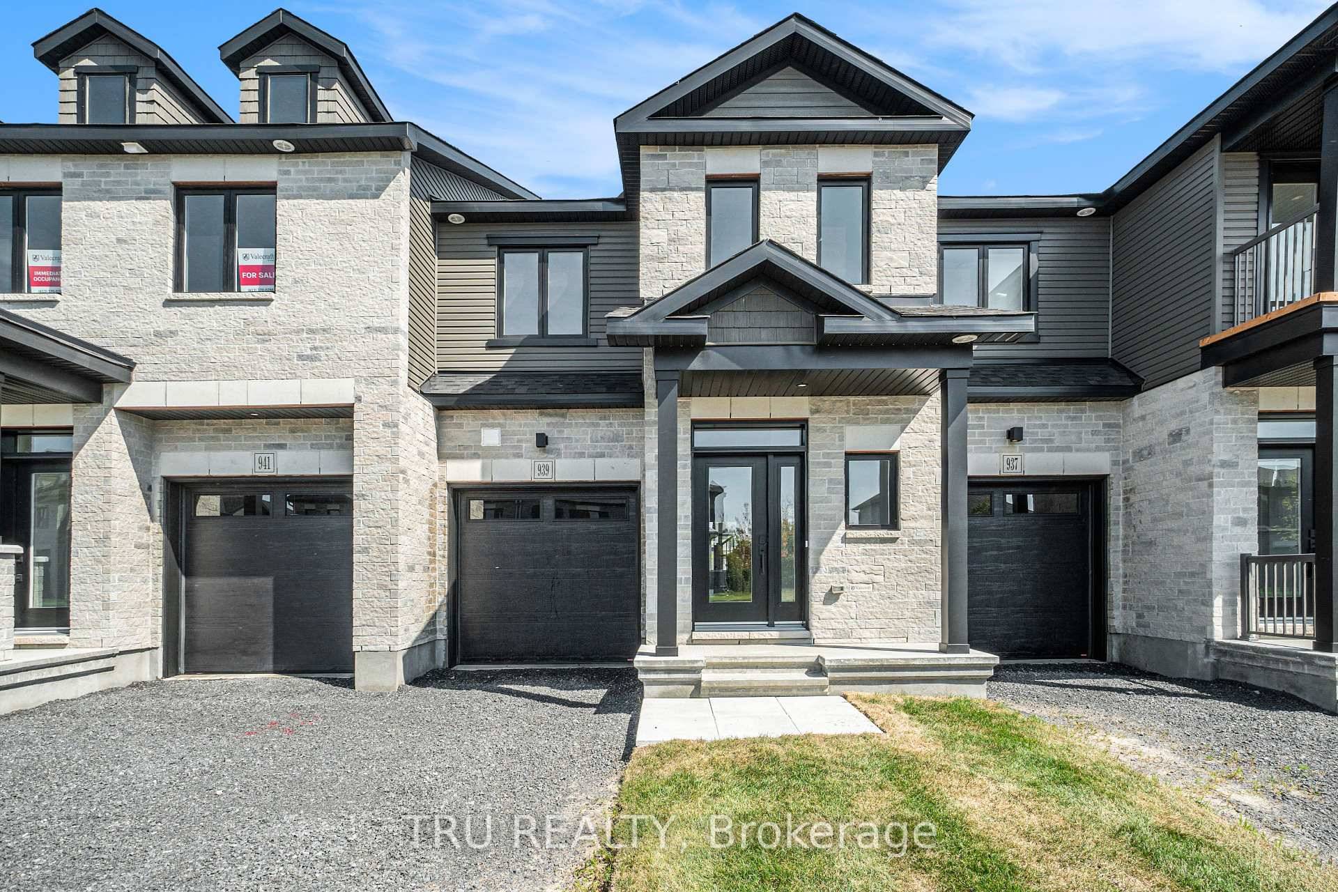 Experience modern living in The Huntley, a thoughtfully designed 3 bedroom townhome by Valecraft Homes, located in the sought after community of Place St.