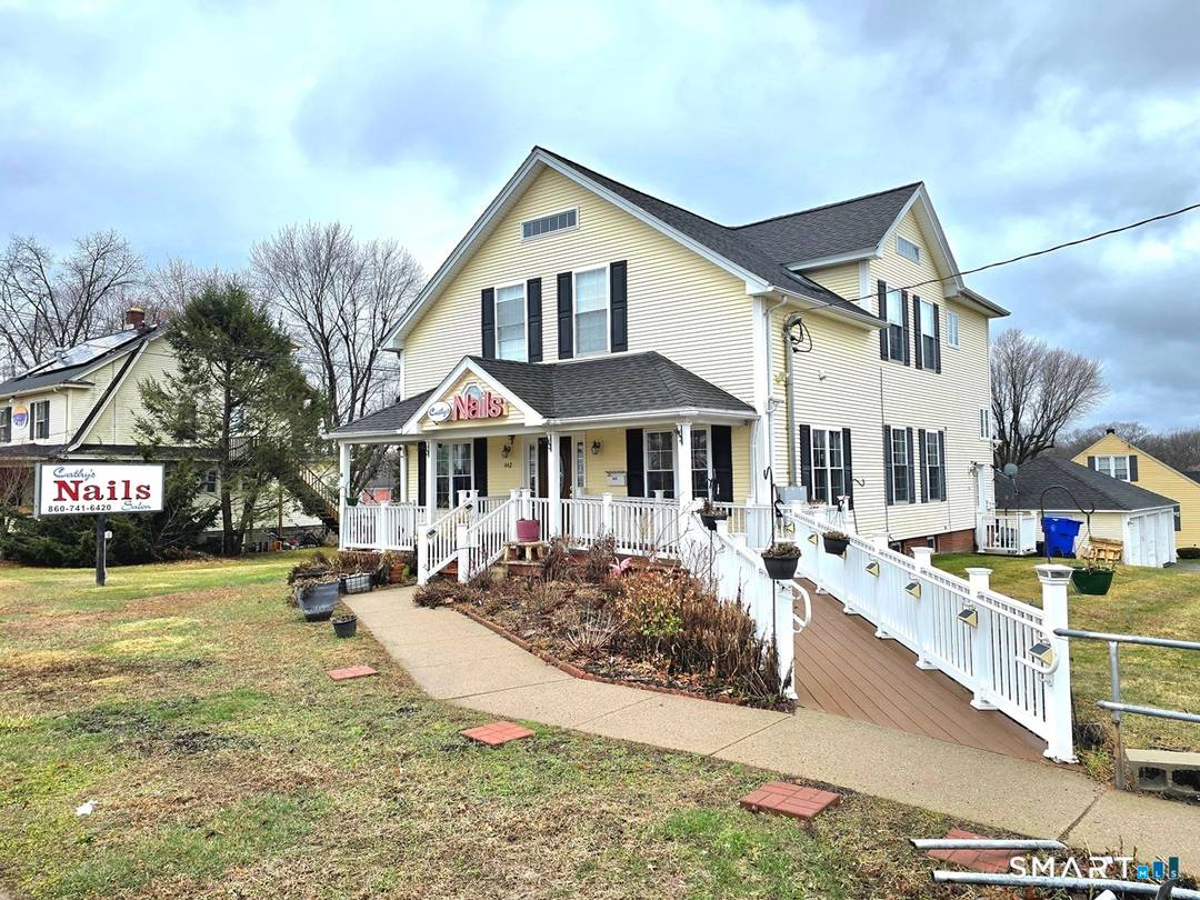 Welcome to 442 Enfield St, a prime investment and business opportunity along a high visibility corridor on the CT MA border.