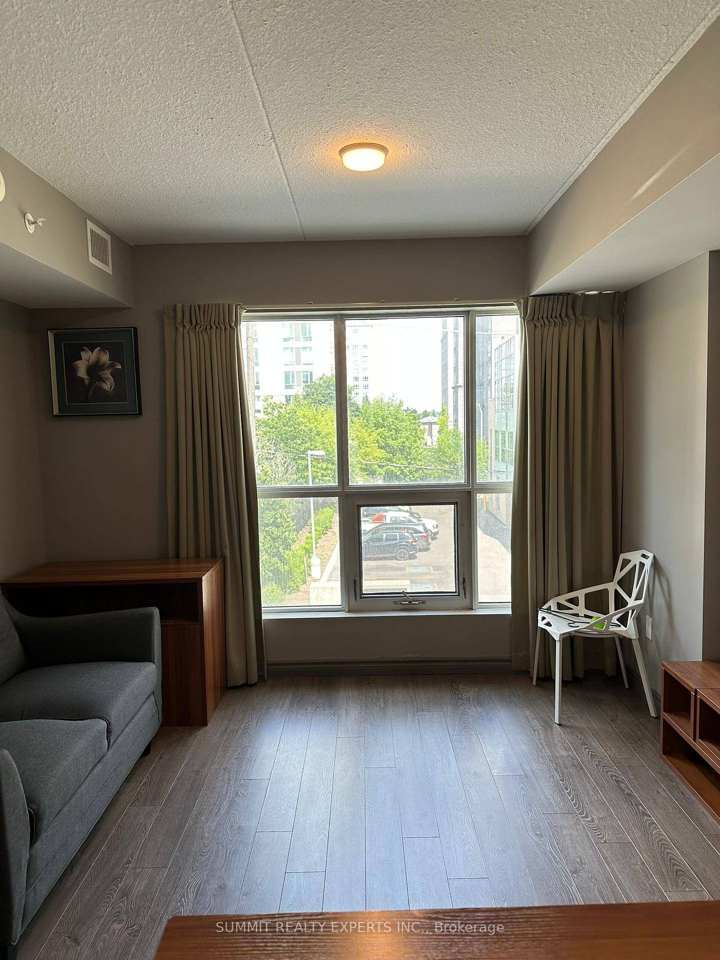 Bright, south facing 1 1 bedroom condo in the heart of Waterloo steps from UW, WLU, and Conestoga College.