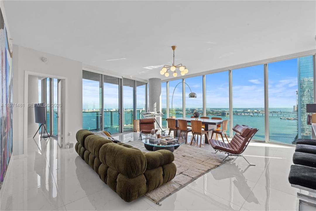 Please be sure to view the walk through video which will show you exactly what this beautiful high floor corner unit overlooking Biscayne Bay is like to live in.