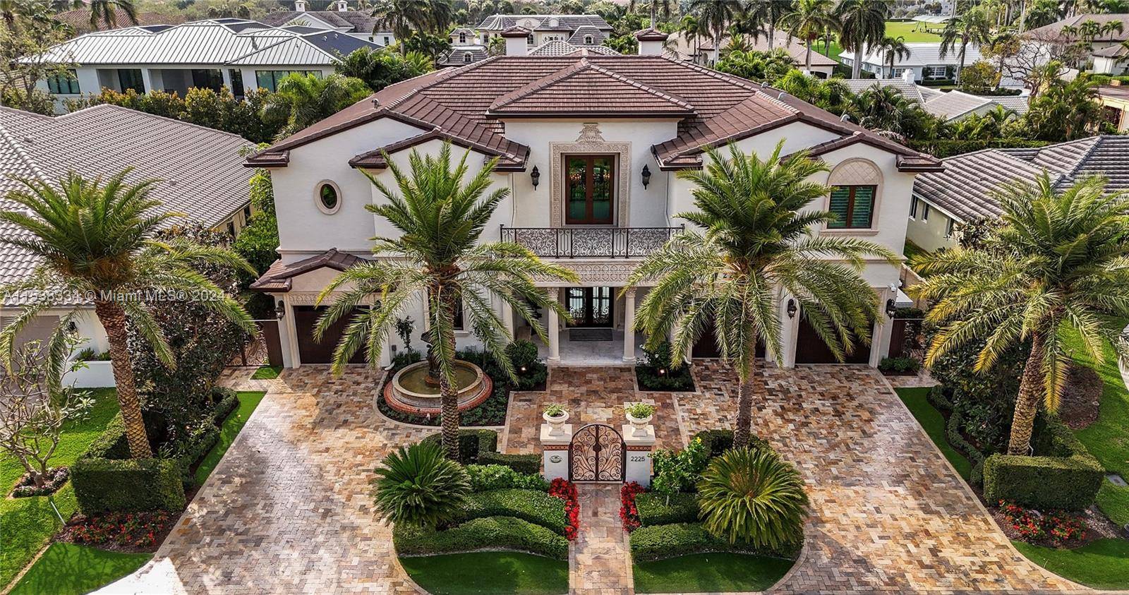 Discover this stunning estate home in the prestigious Royal Palm Yacht and Country Club in Boca Raton, Florida.