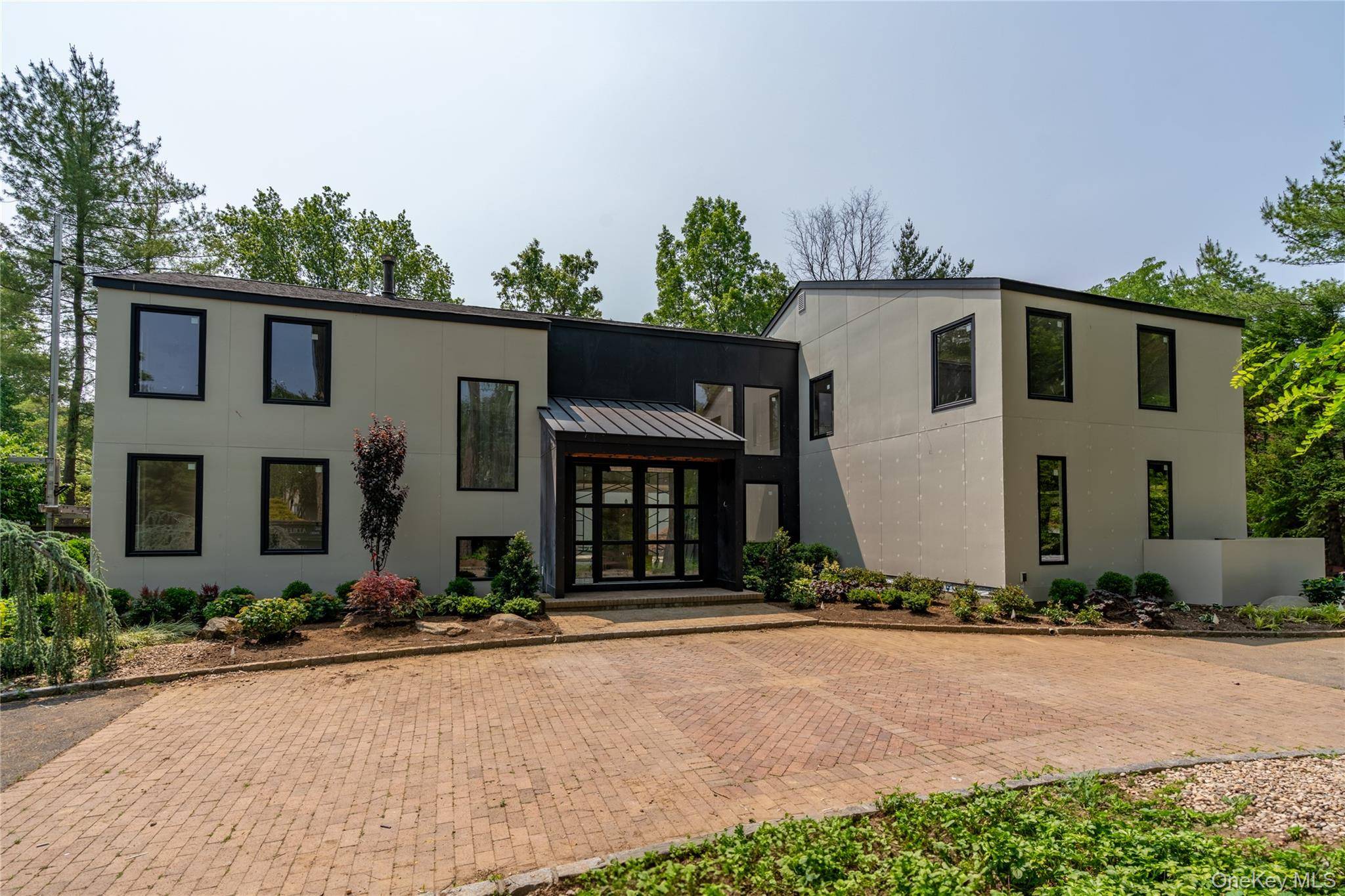 Elegant Contemporary Colonial Fully Renovated with Modern Flare.
