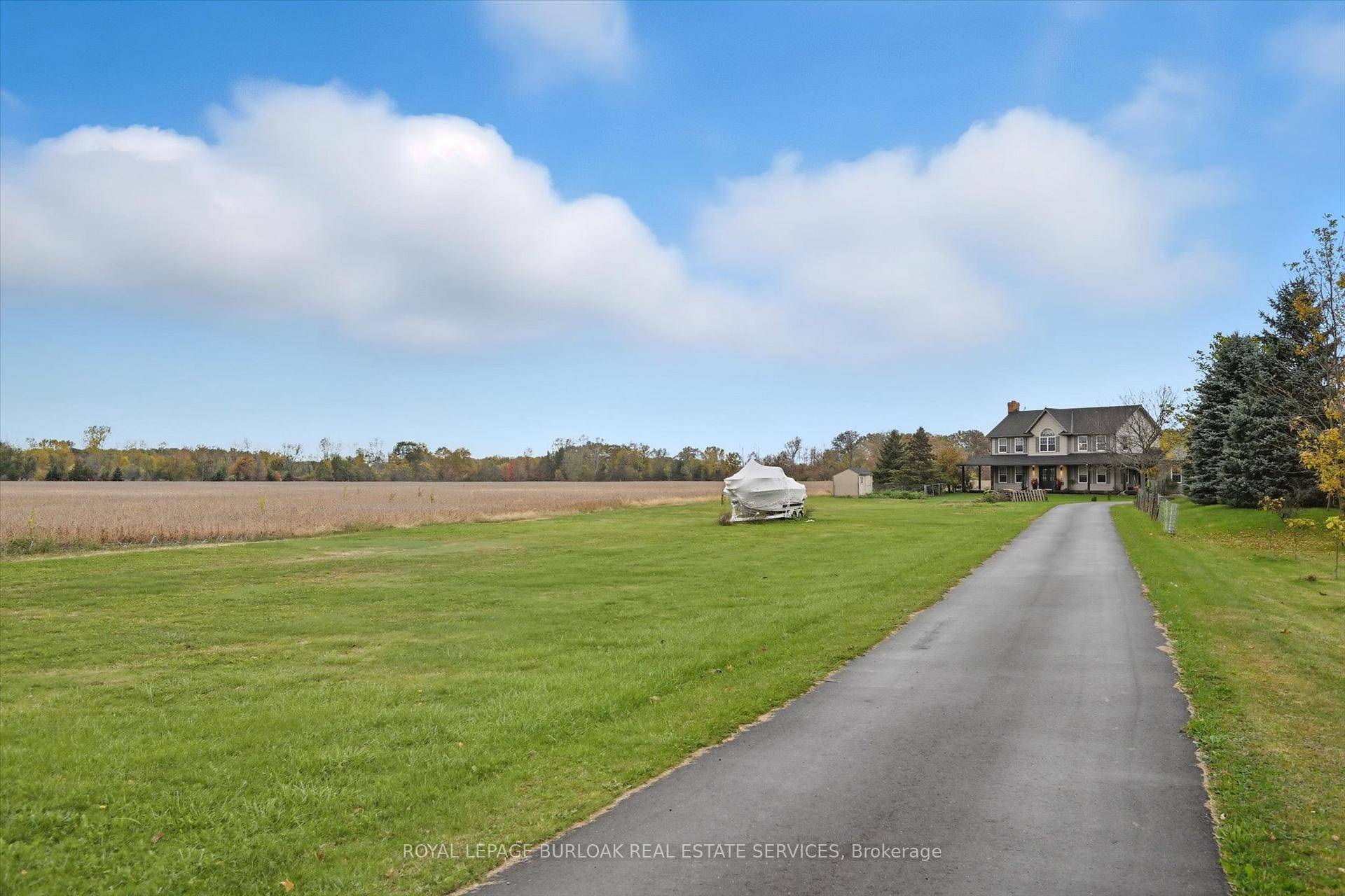 Escape to your own slice of countryside paradise with this beautifully updated hobby farm set on over 4 picturesque acres in the heart of Niagara.