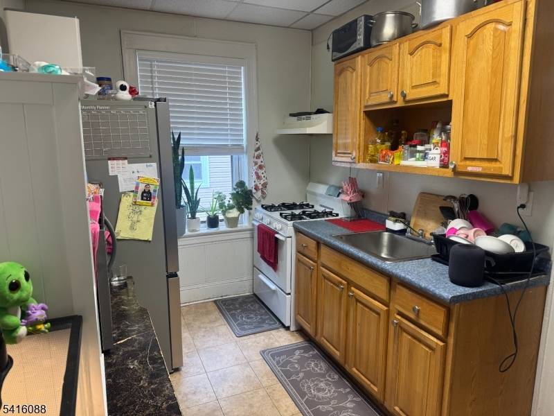 Don't miss this exceptional investment opportunity to own an 8 unit apartment complex ideally situated in a desirable residential neighborhood in the heart of Dumont.