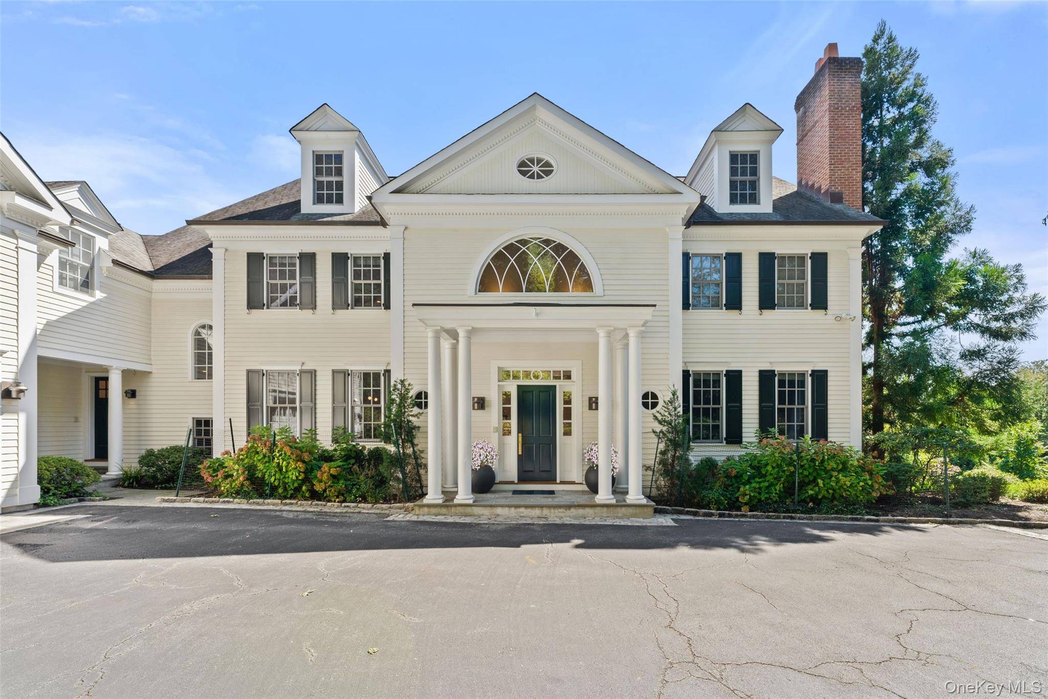 Welcome to 2 Belmont, an impeccably maintained modern colonial set on over an acre of beautifully landscaped grounds in sought after Ardsley Park.