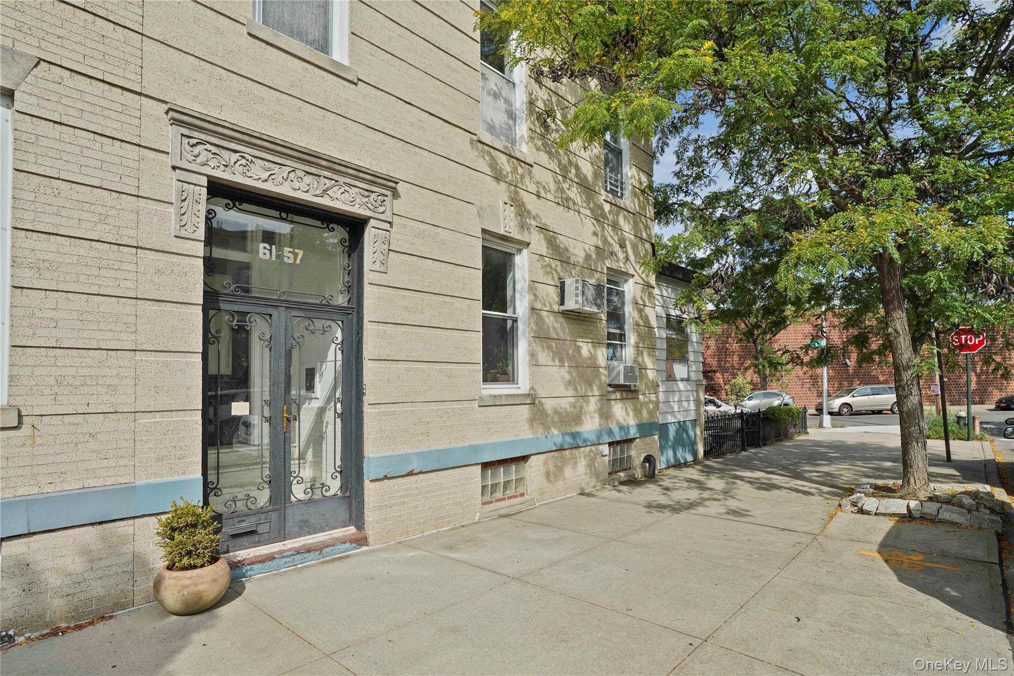 One of a kind two family home on leafy Linden Street in Ridgewood s Fresh Pond Traffic Avenue Historic District.