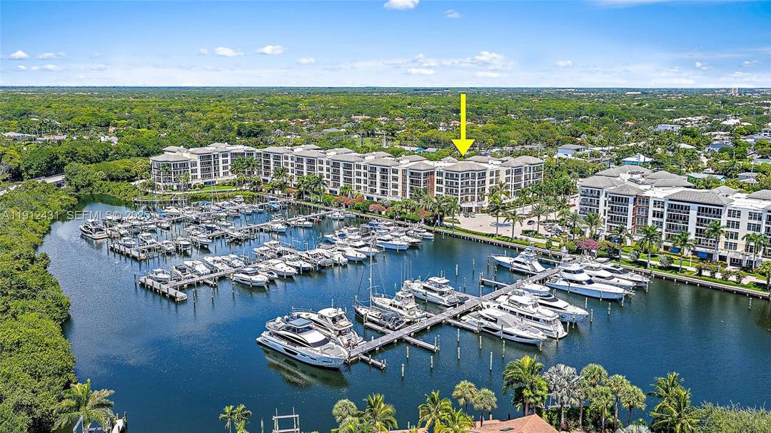 Move in for season. Discover refined coastal living in this remarkable penthouse offering sweeping marina intracoastal views.