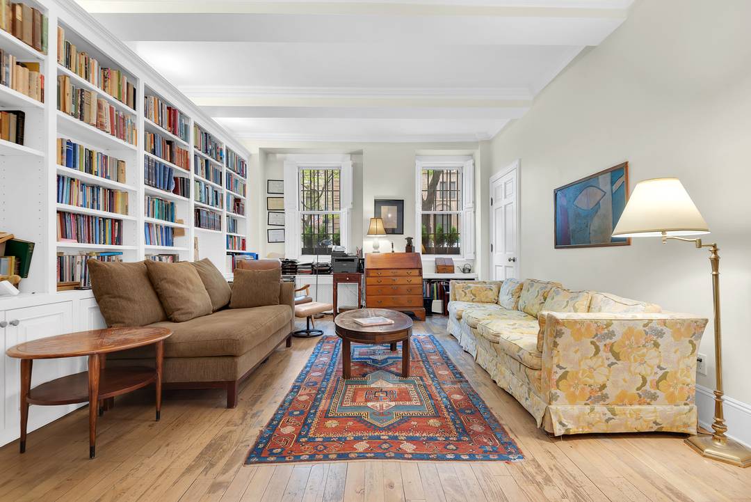 Nestled in the heart of Carnegie Hill, this rare ground floor apartment offers the timeless elegance and comfort of a private townhouse within a full service cooperative.