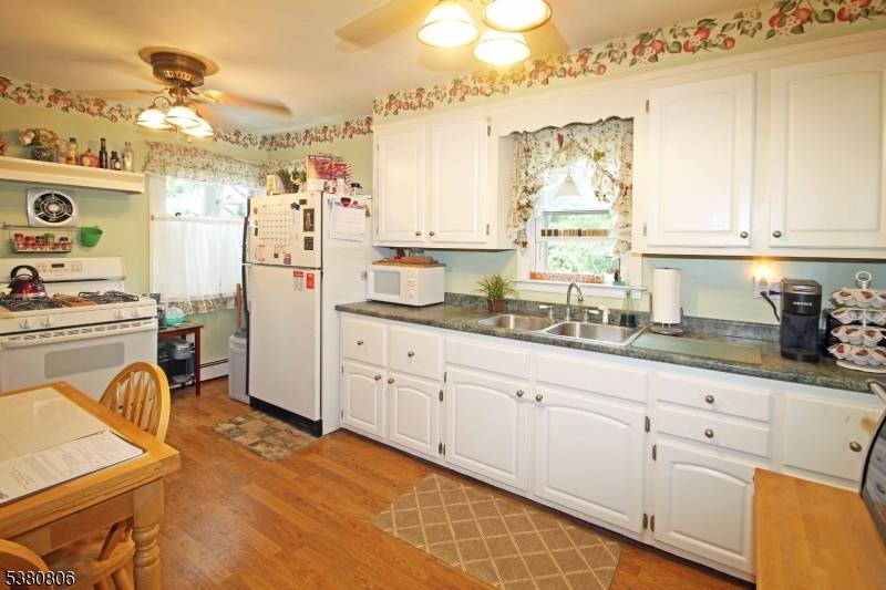 Well maintained and updated home, set at the end of a cul de sac with a huge level yard is approx 1 2 acre in size !