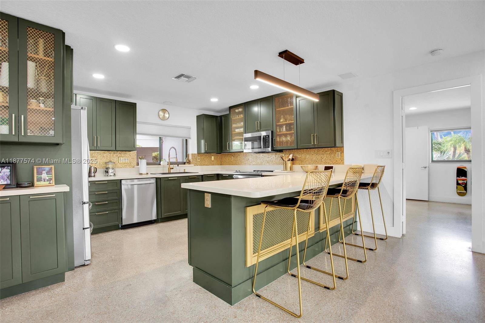 Set at the end of a private cul de sac, this renovated 3BR 3BA single story home sits on a coveted point lot with 135 ft.