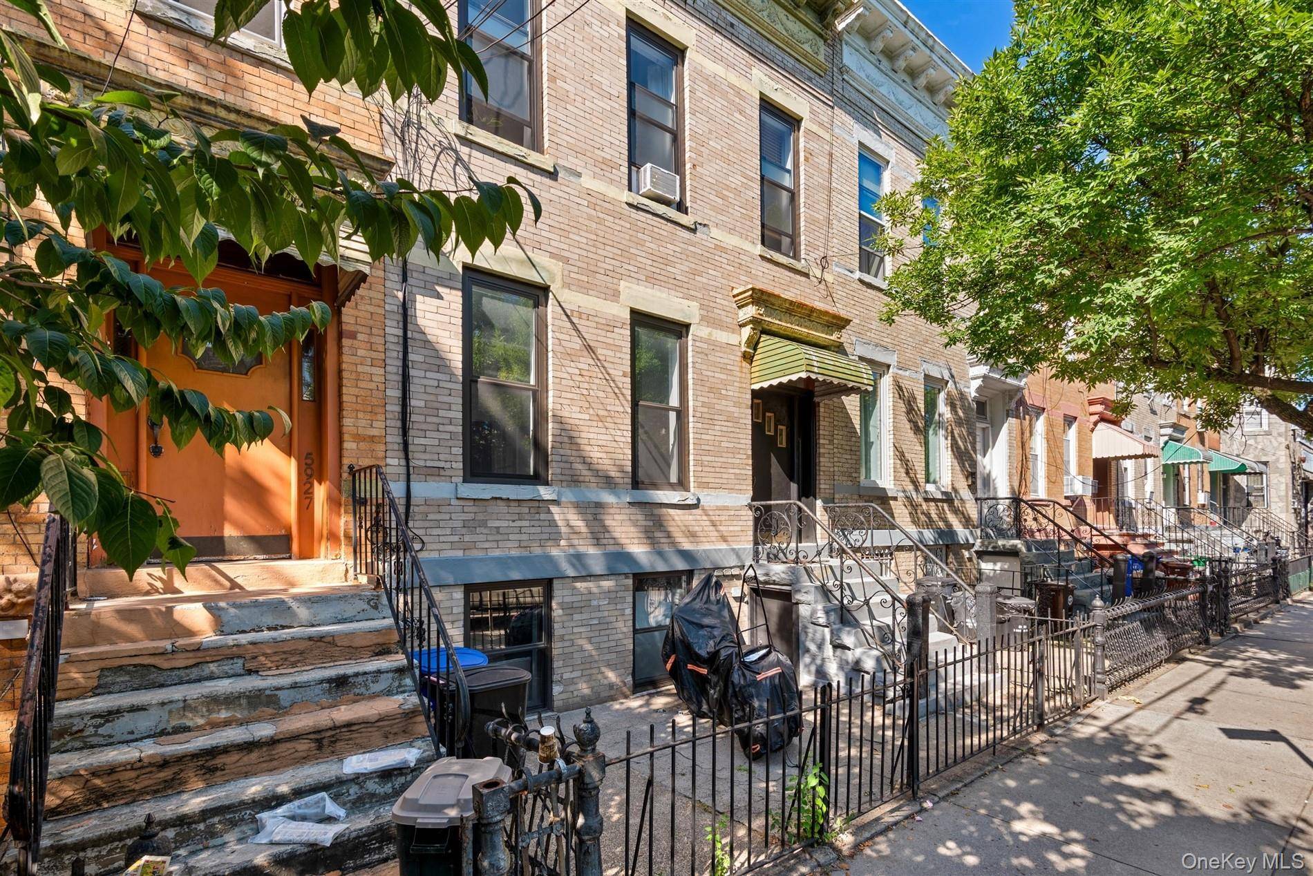 Charming 2 Family Brick Home in Prime Ridgewood Location.