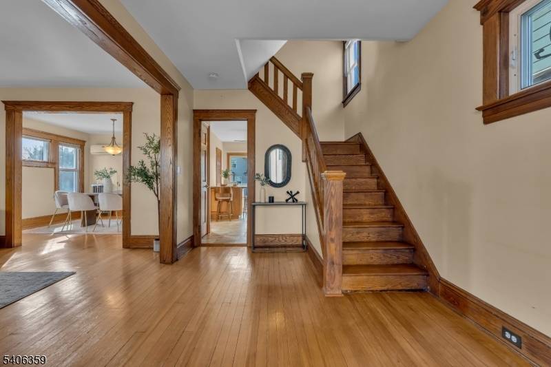 Set on a desirable extra wide lot, this classic Colonial home offers space, character, and modern comfort in a convenient location, just steps from schools and retail.