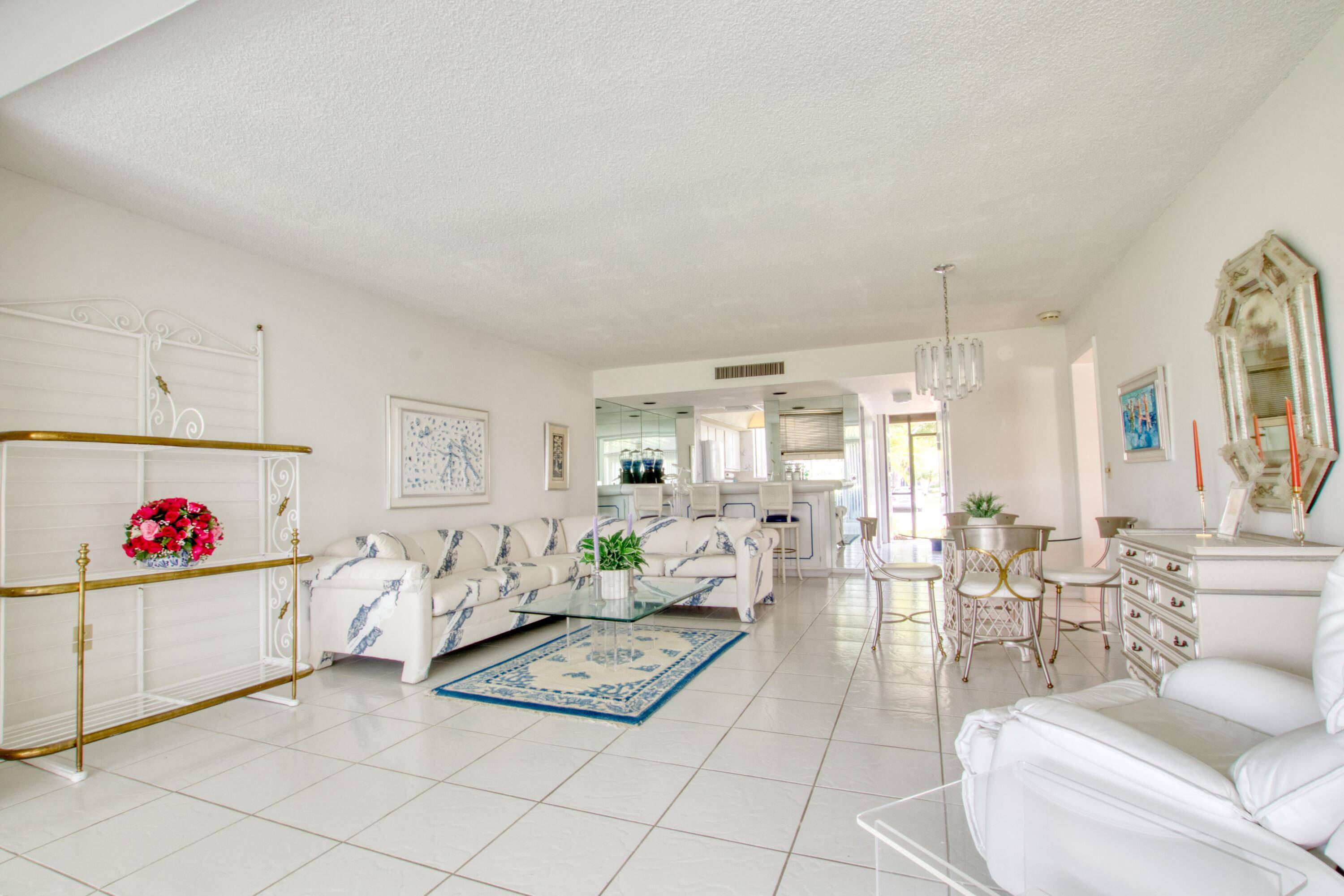 3 2. 5 town home with oversized glass Florida Rm 2 master bedrooms, one upstairs one downstairs.