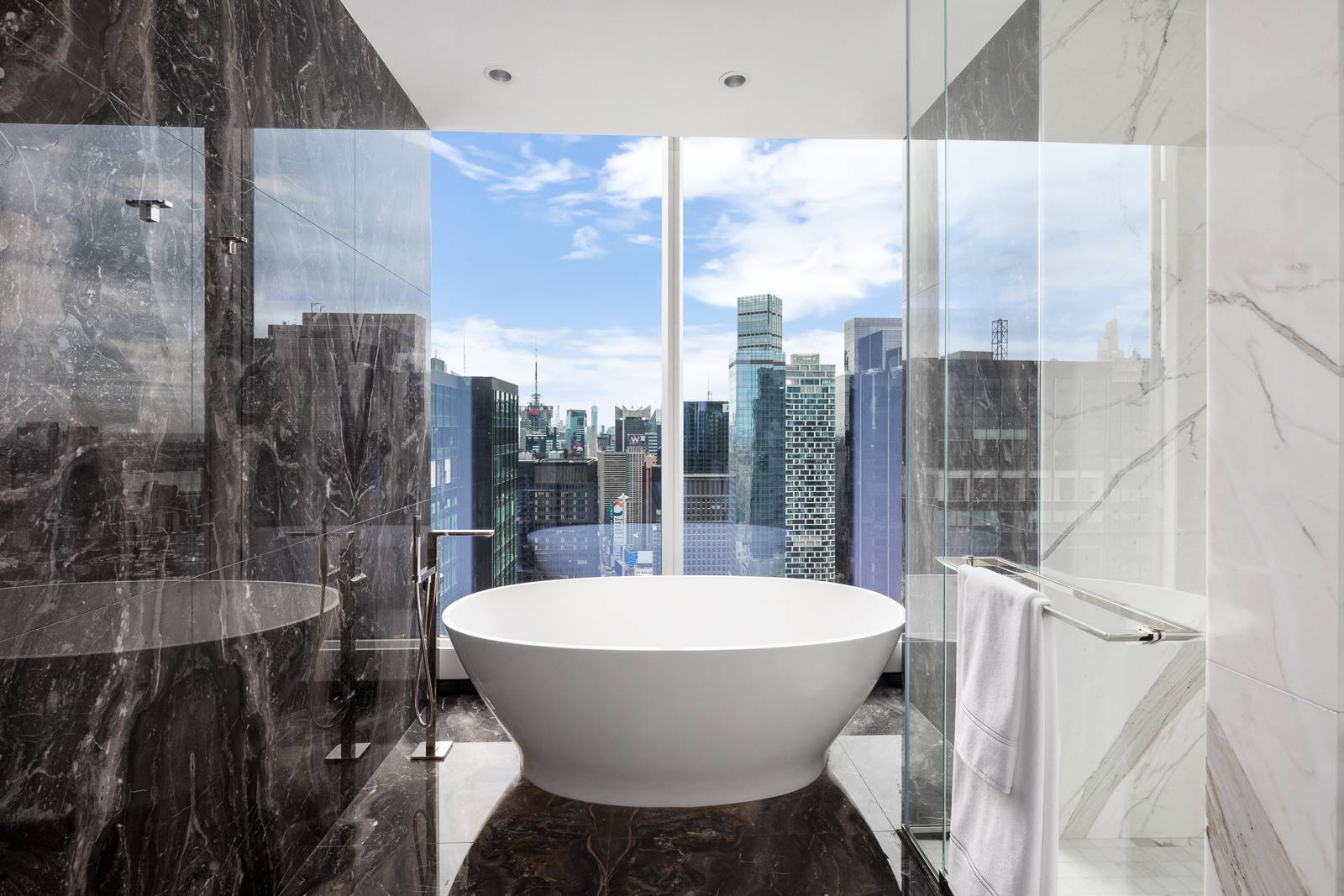 This three bedroom, three and one half bathroom residence at Central Park Tower offers gracious living enhanced by quintessential Central Park views from an elevation over 550 feet.
