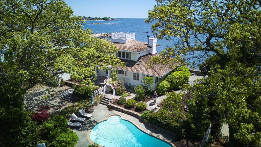 Exclusive Waterfront Retreat in Gated Island Community Just One Hour from NYC.