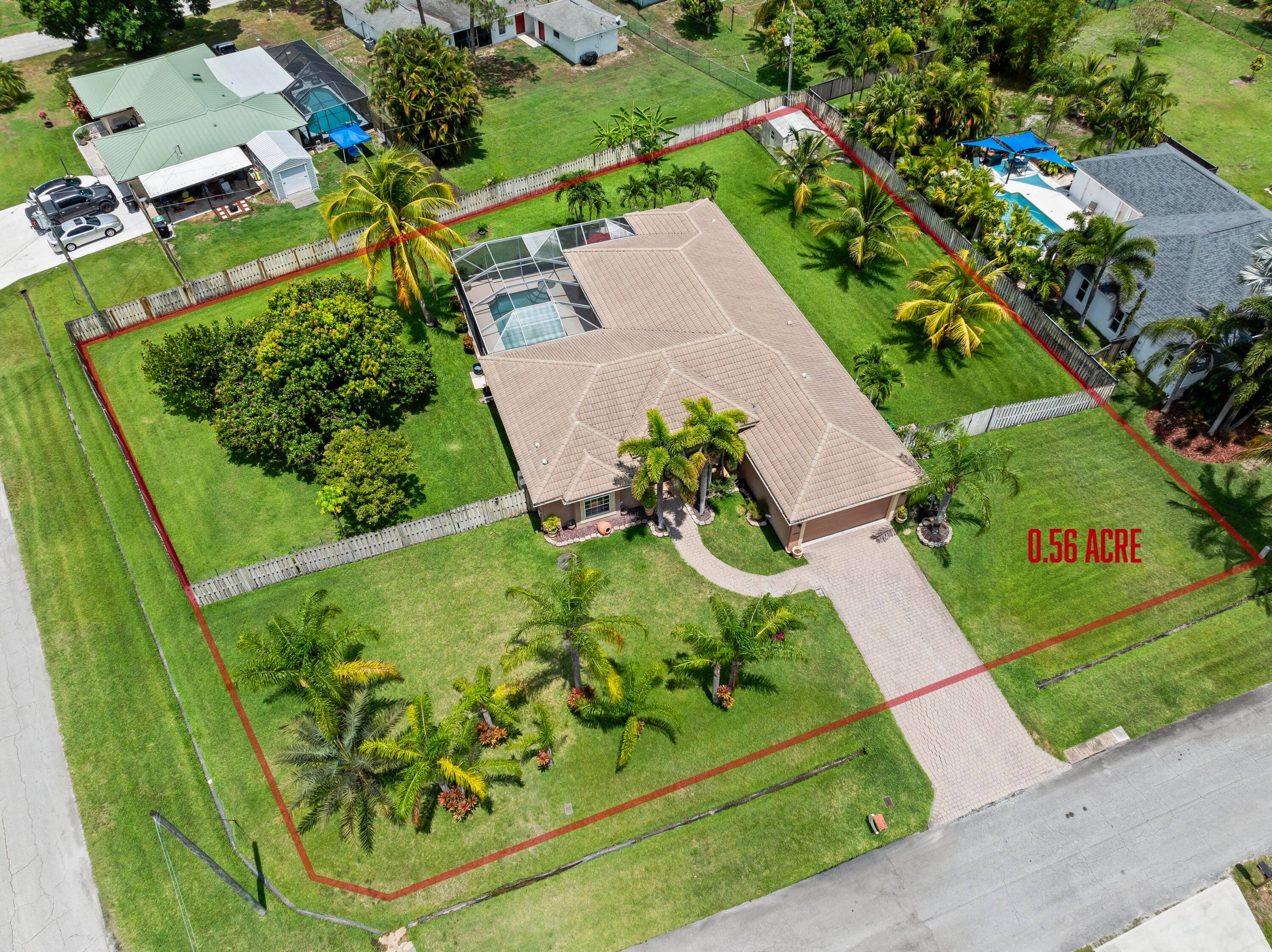 Welcome to 1992 SE Fairfield Street in Port Saint Lucie this custom built Aburton home sits on a spacious 0.