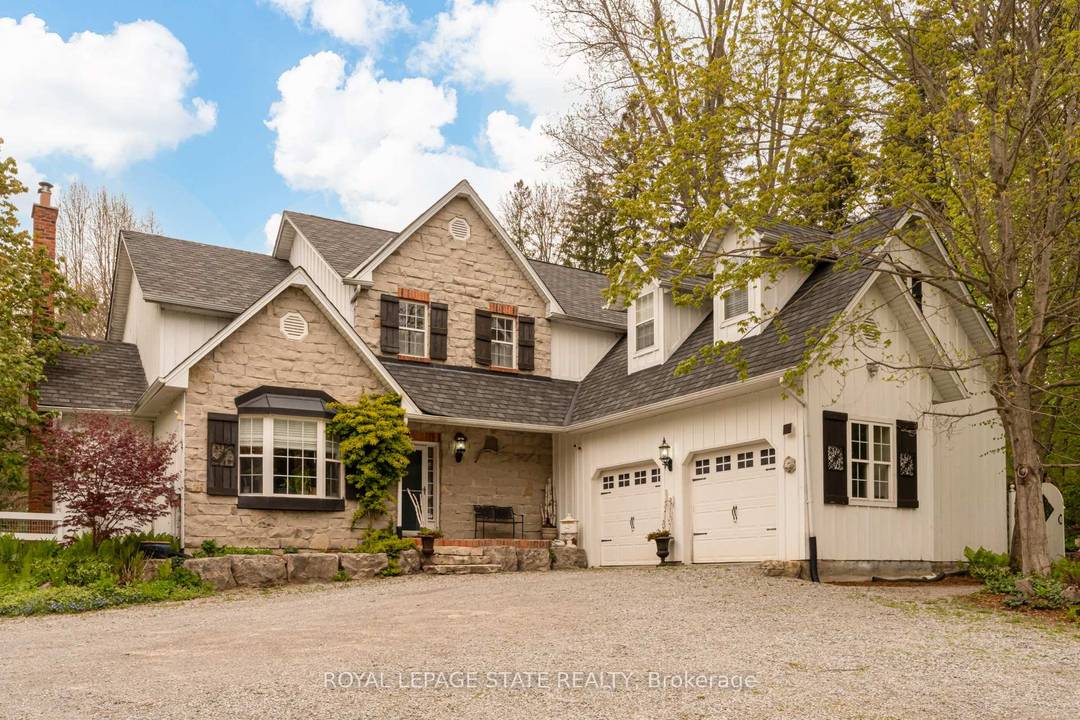 Set in the picturesque Hamlet of Mineral Springs, one of Ancaster's most sought after rural communities, this custom built modern farmhouse offers a rare combination of luxury living, privacy, and ...