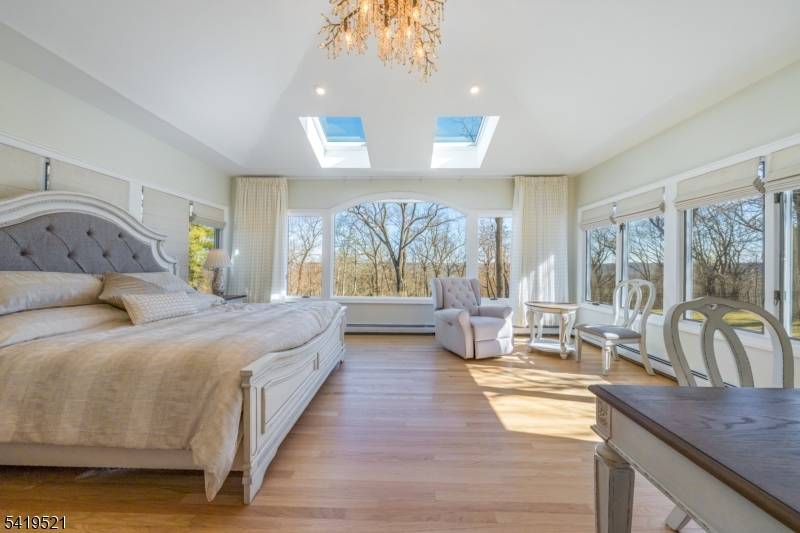 29 CANDACE LANE CAPTIVATES WITH POOL, PRIVACY, 1st FLOOR PRIMARY ON NEARLY AN ACRE OF STUNNING PROPERTY !