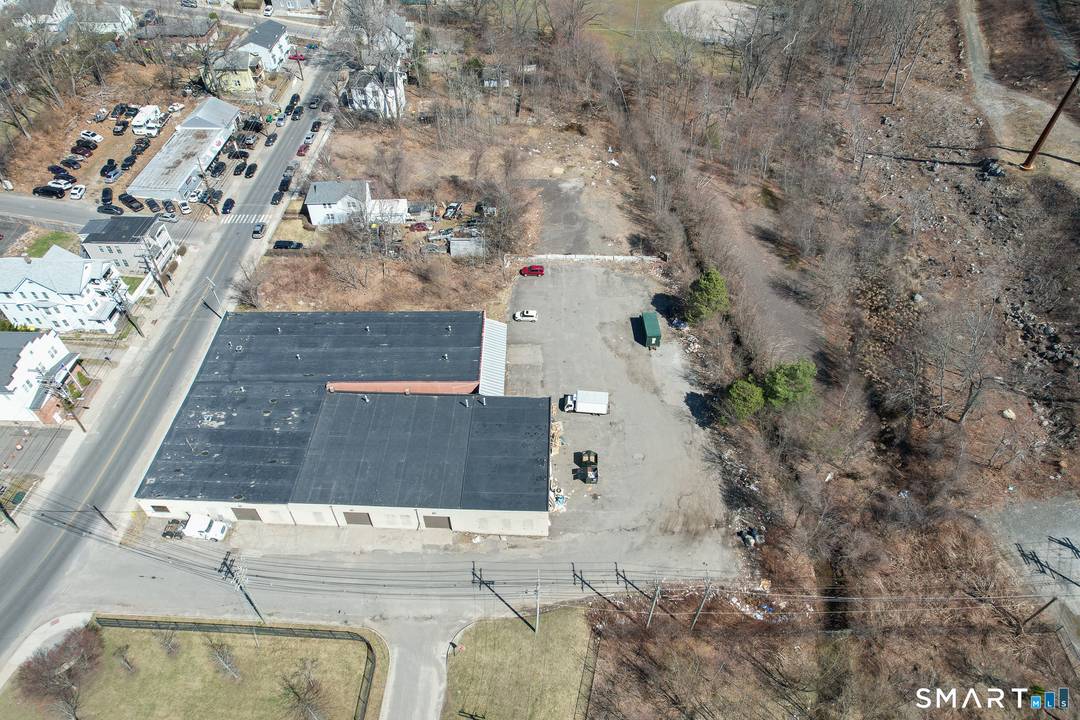 Exponential Potential Abounds with this 5 Parcel Under developed, RM Zoned Moderate Density Multi Residence parcel currently being utilized as light industrial on only a fraction of the parcel.
