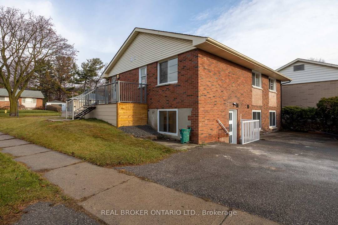 This thoughtfully designed lower level apartment unit offers an inviting open concept layout with a generous living and dining area featuring vinyl flooring, pot lights, and a large window that ...