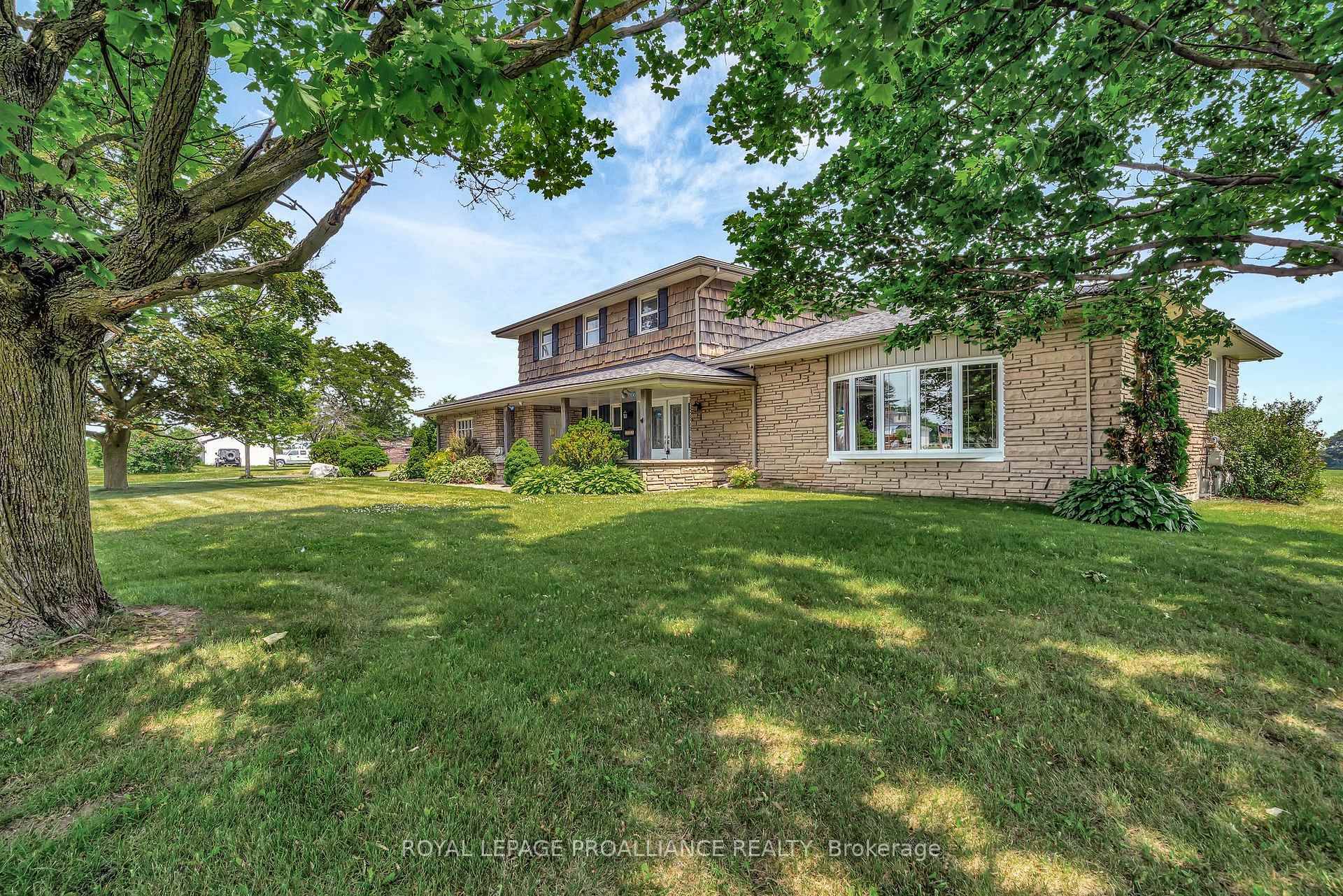 Timeless country beauty on one of the most recognized rural properties along Highway 62.