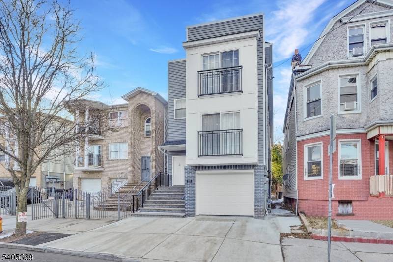 Stunning contemporary residence with striking curb appeal and clean architectural lines.