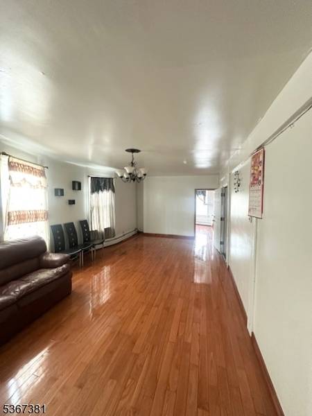 3 story mixed use offering 3 units comprised of two 3 BD apartments anchored by one neighborhood retail storefront.