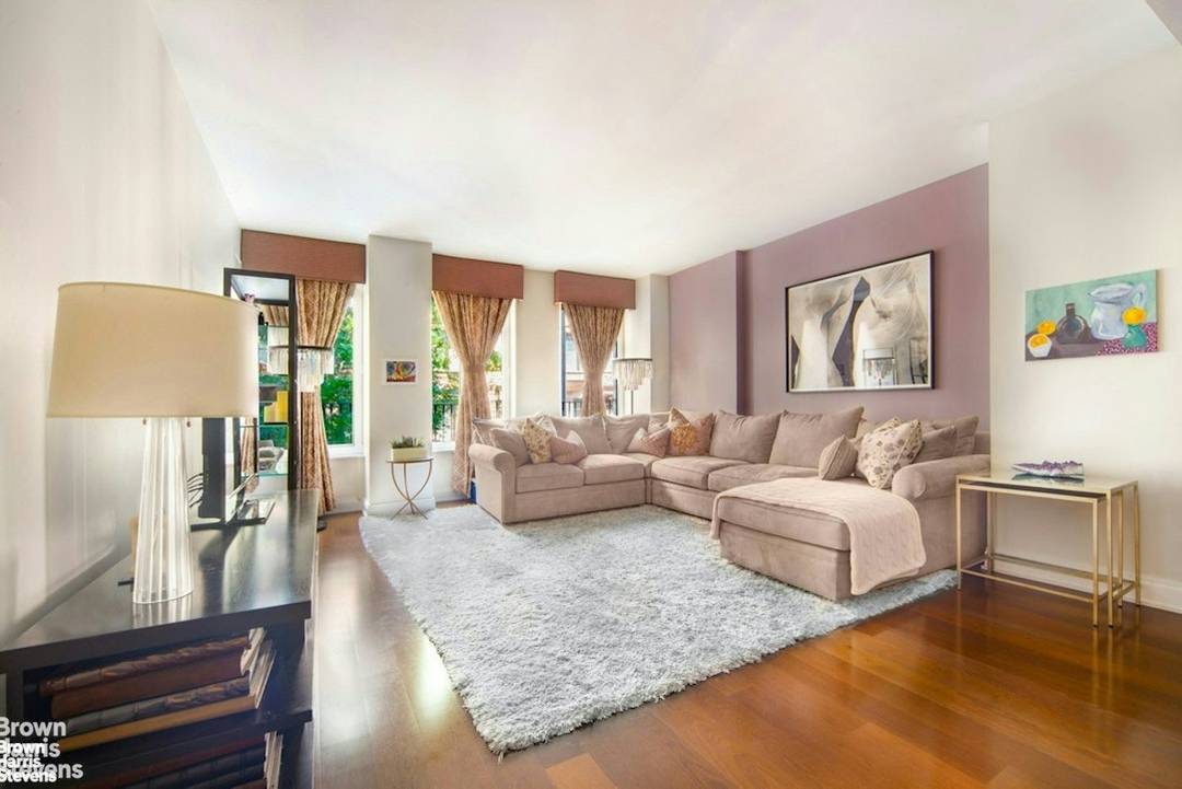 This gracious three bedroom residence overlooks a charming tree lined street, with a loft like Living Dining Room with tall windows that open like French doors onto decorative wrought iron ...